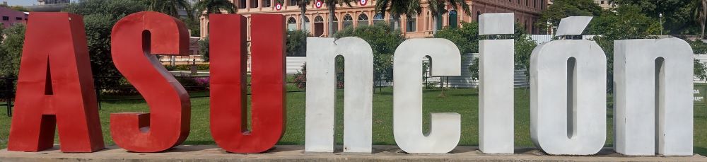 The Asunci&oacute;n sign at the riverside park.