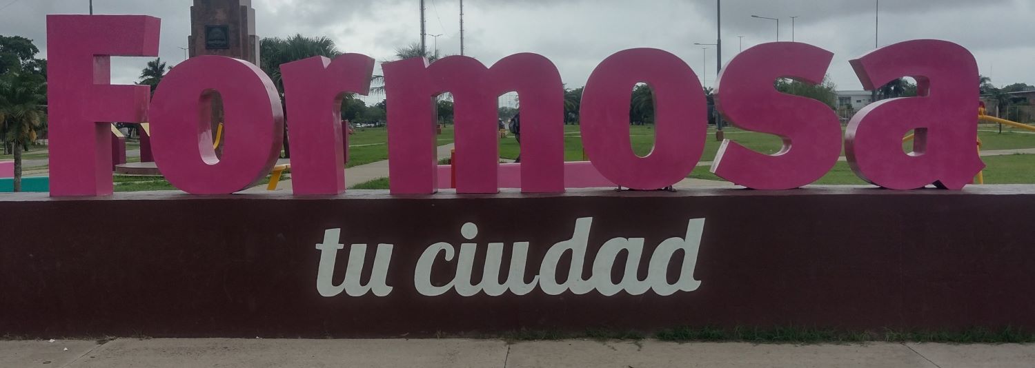 Formosa sign at the city entrance, in the turn circle at the highway 11, with the Monumento a la Virgen del Carmen.