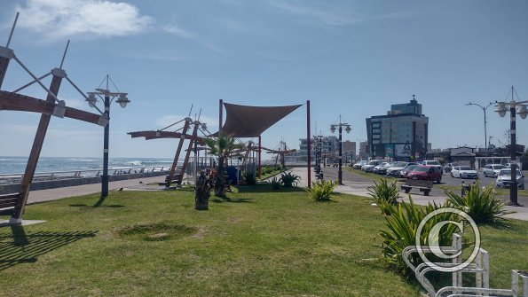Alongside the beach at Av. Arturo Prat Chacon y Calle Orella