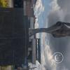 Statue of a woman in roundabout at Ruta 45 and Transversal 21