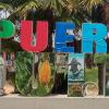 City name sign at the town entrance on Ruta 28, west side of town