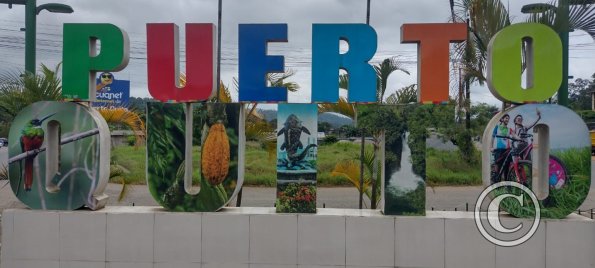 Puerto Quite city name sign, east entrance on Ruta E28