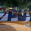 City name sign in Parque 12 de Mayo at Simon Bolivar and 9 de Octubre