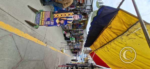 Streetside venders selling school supplies
