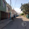 Calle Huascar alongside Parque Julio Ernesto Granda from Calle Los Incas