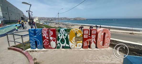 Huacho sign at the beginning of the Malecon Rocca