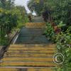 Stairs from Av. Circunvalacion going up hill to unnamed streets