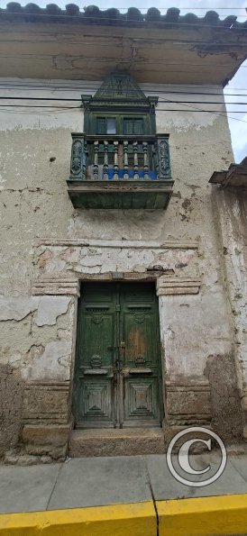 Jiron Bolivar and Jiron Canete-A carved wooden balcony, early 1800s