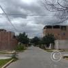 Calle Los Geranios y unnamed road at edge of town