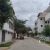 Calle Los Tuipanes y unnamed road at edge of town