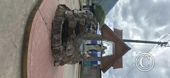 Religeous statue and water feature outside the mercado