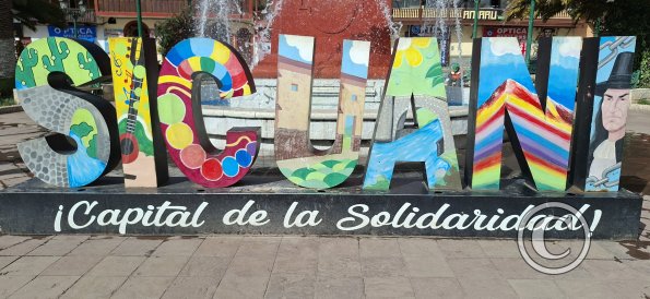 city name sign in the Plaza de Armas