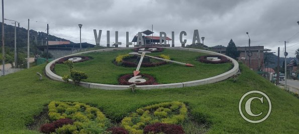 city name sign and clock at the terminal (2)